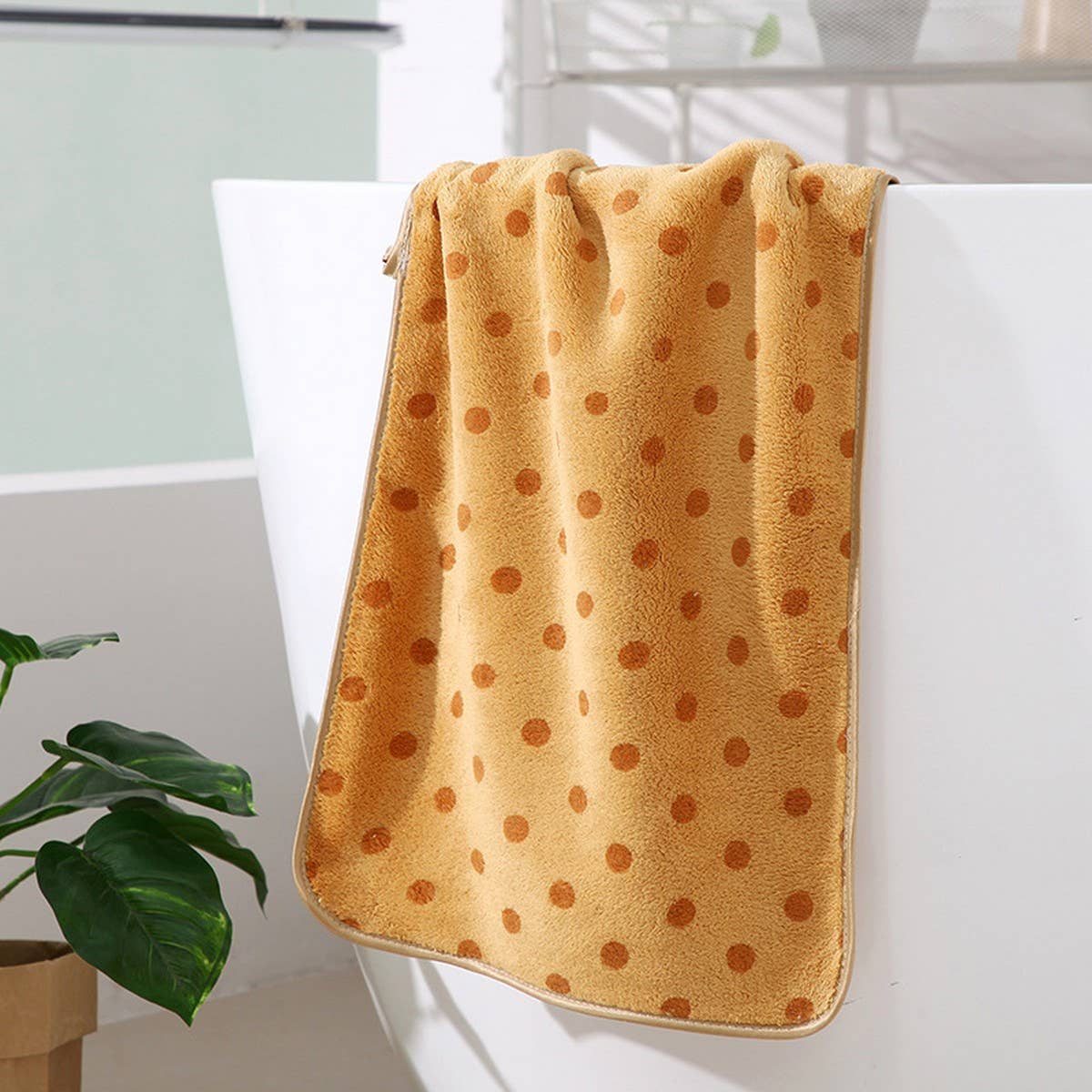 CORAL FLEECE POLKA DOT ABSORBENT FACE TOWEL Purple